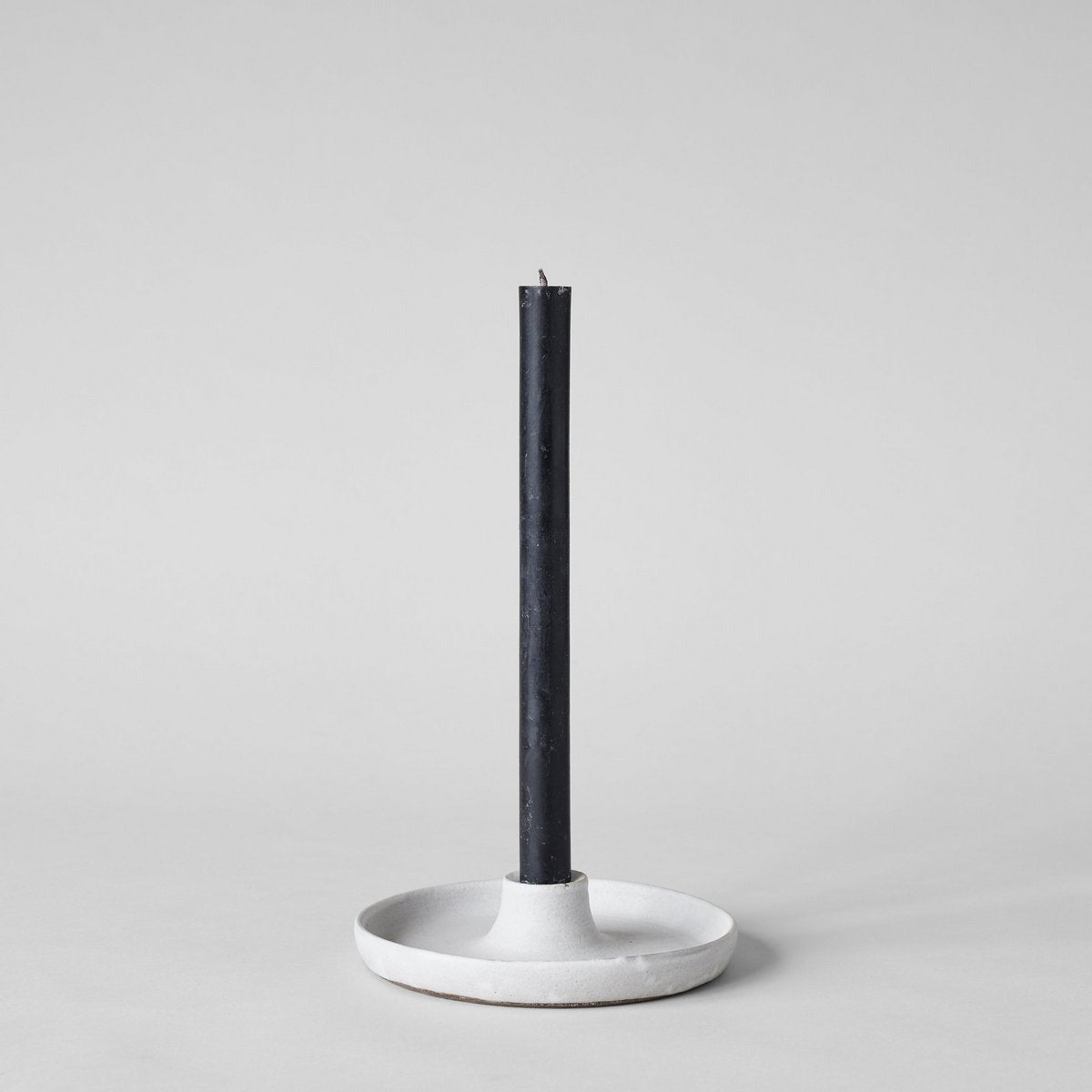Artisan candle set featuring grey stoneware holder and beeswax church tapers