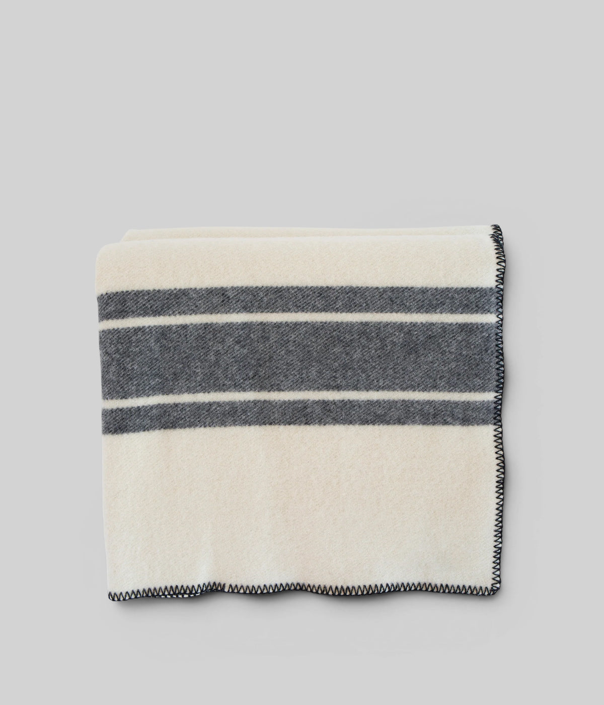 100% merino wool blanket in midnight blue stripe woven in Ireland from pure merino