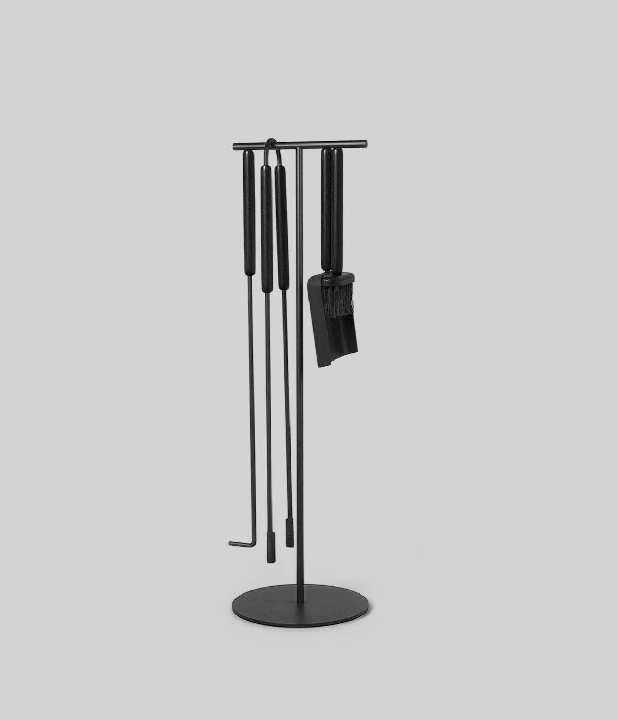 Modern black fireplace tools with brush, shovel, poker, tong, and vertical T-stand