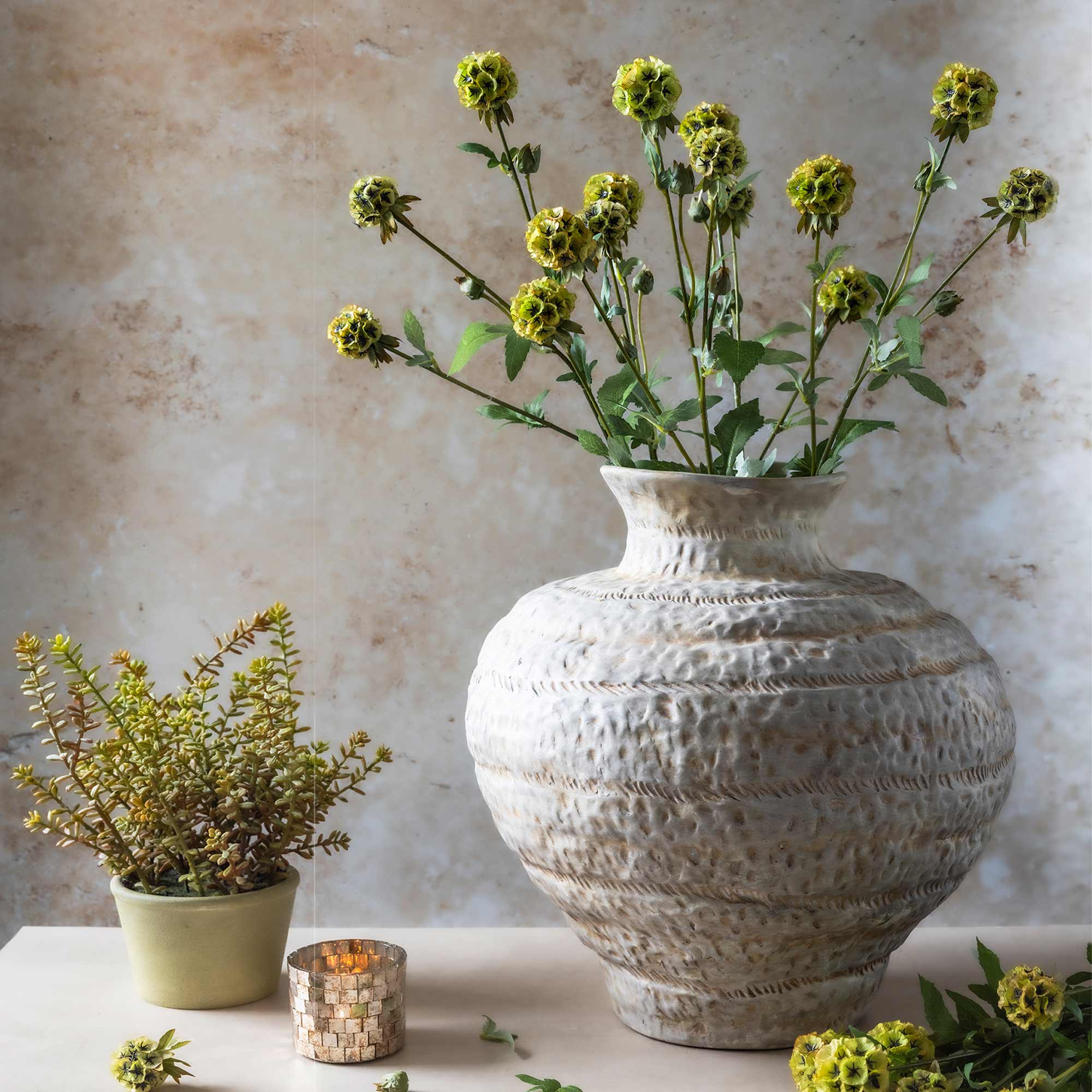 Artificial scabiosa stellata with inky centers and open spacing