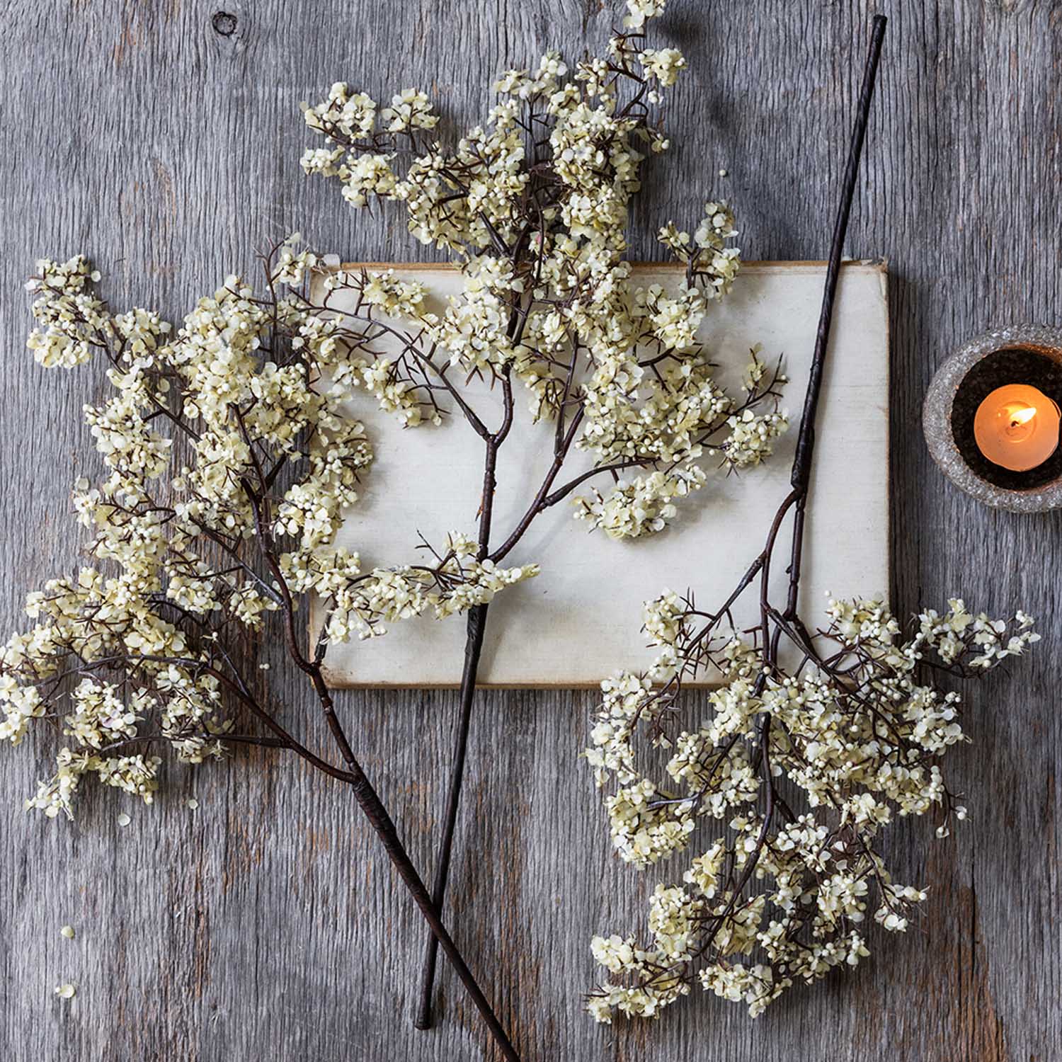 Artificial Sedge, Winter Dew featuring fine dark branching stems and delicate cream blossoms on a faux botanical stem. 