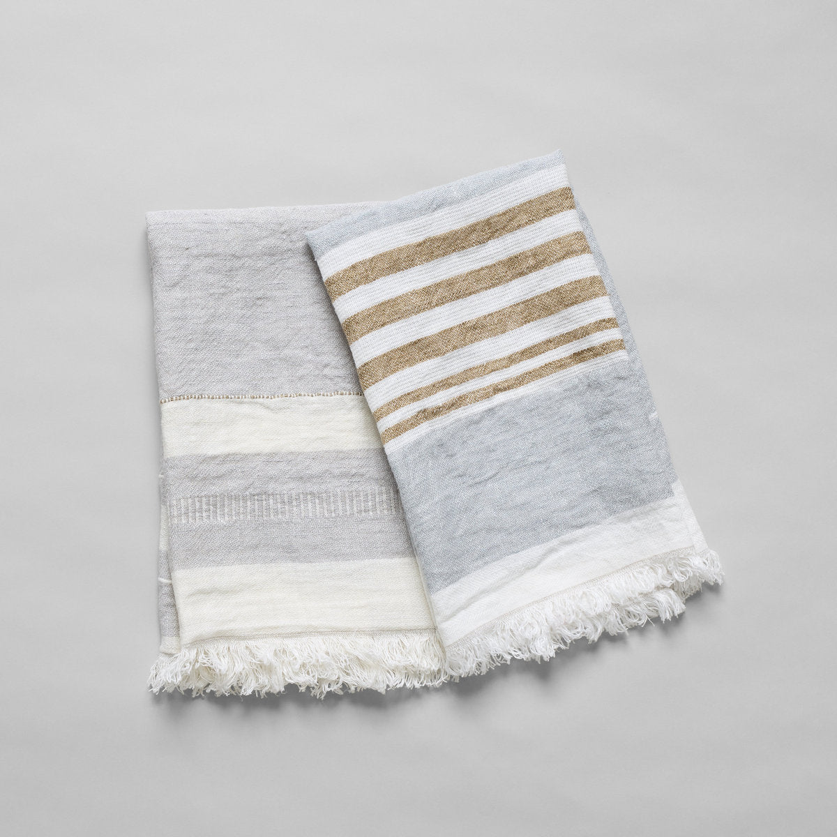 Lightweight artisan linen towel for polishing glassware or resting beside a ceramic sink