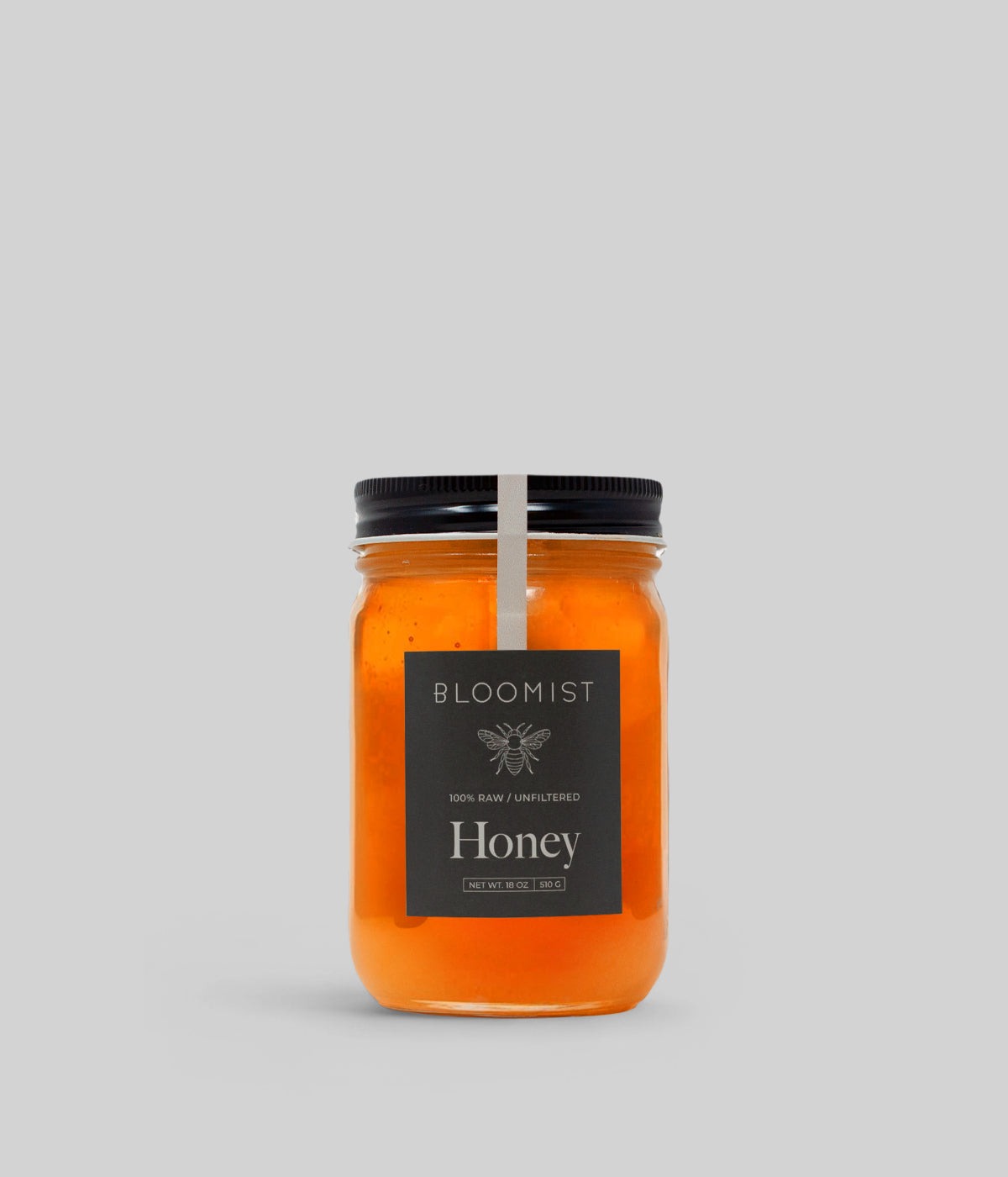 Raw unfiltered Berkshire honey with natural enzymes and golden aromatic texture