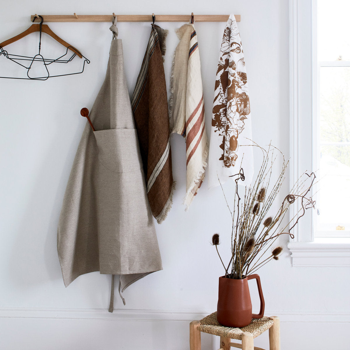 Kitchen and guest bath linens made from moisture-loving flax with subtle stripe detail