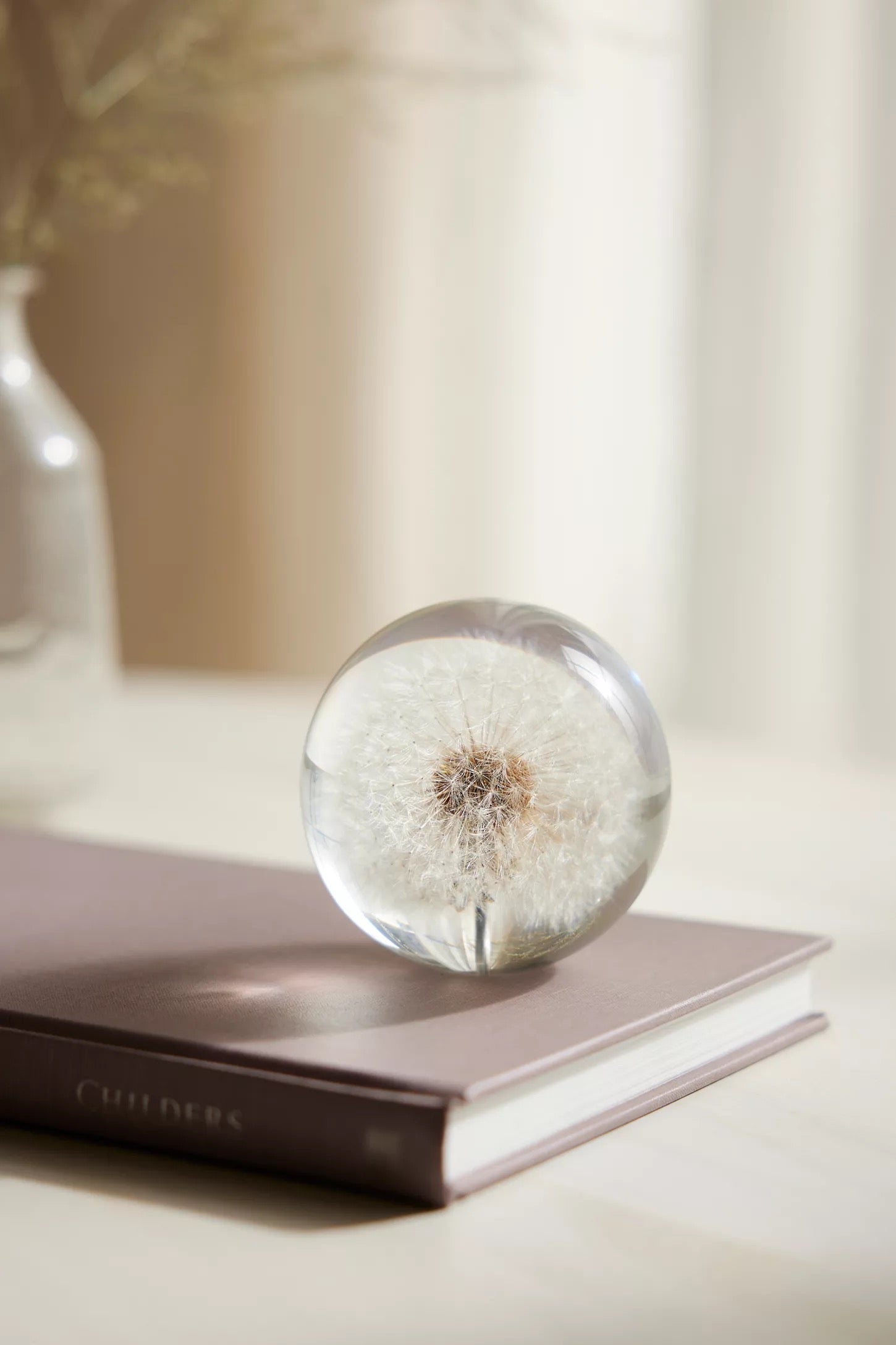Hand-polished paperweight dandelion cast in clear polyester resin