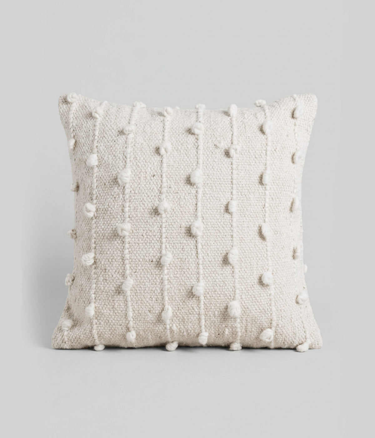 Handmade throw pillows woven from 100% undyed natural wool