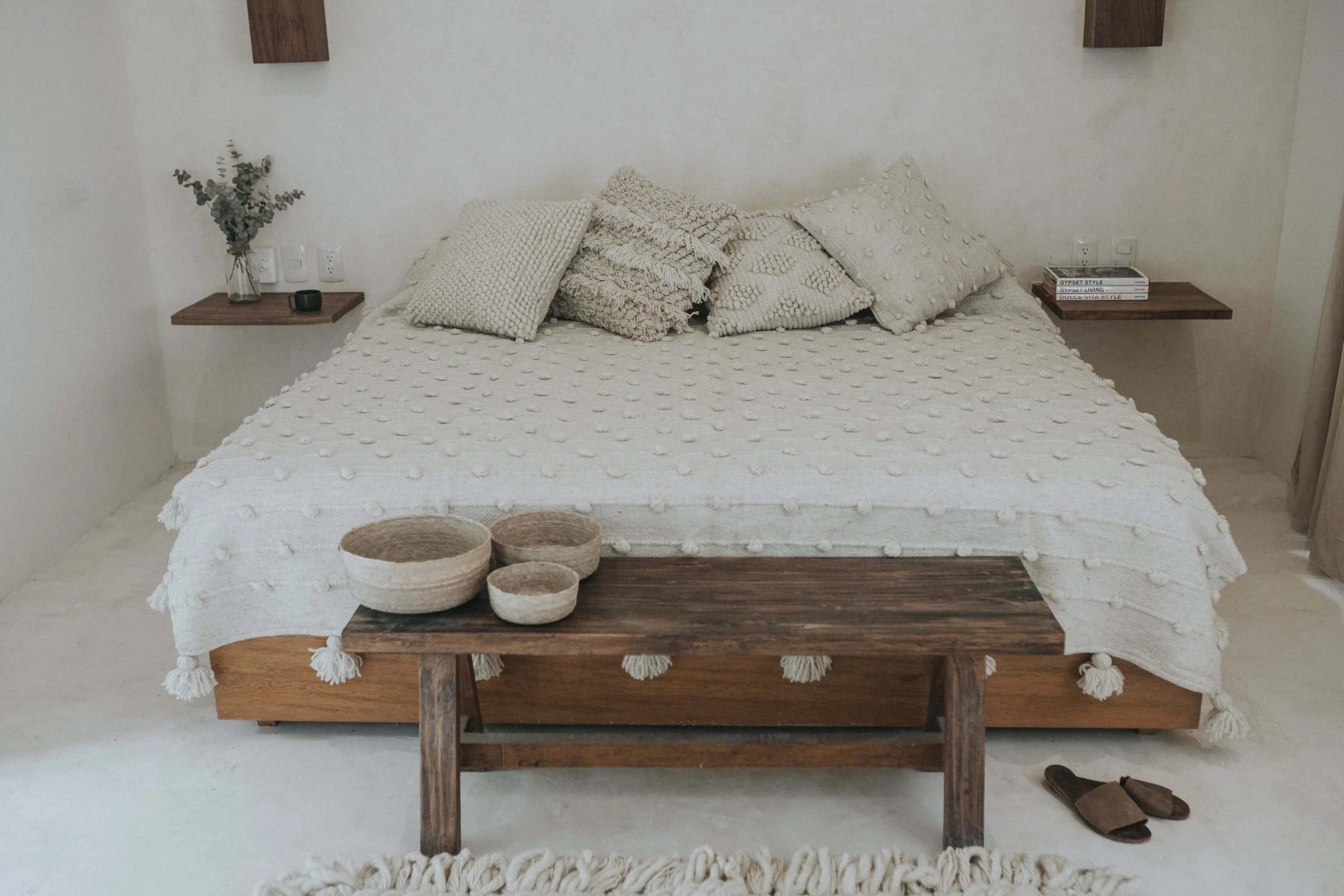 Minimalist throw pillows woven on a traditional foot pedal loom