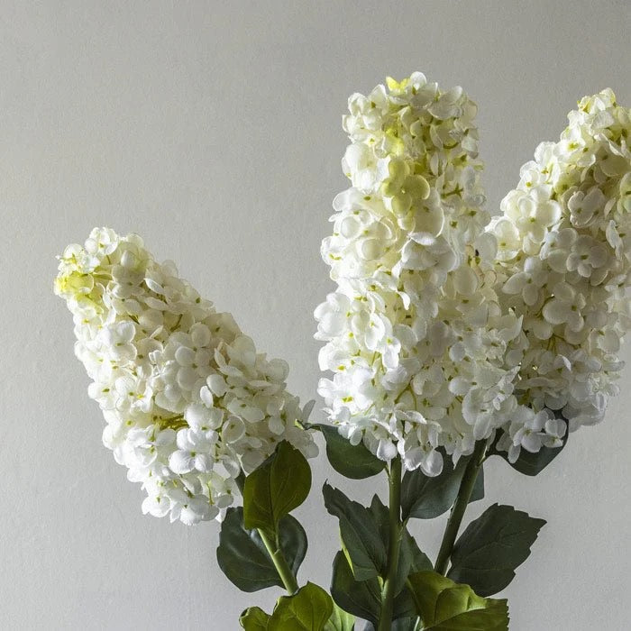 Faux Hydrangeas with soft cream petals and flexible stems