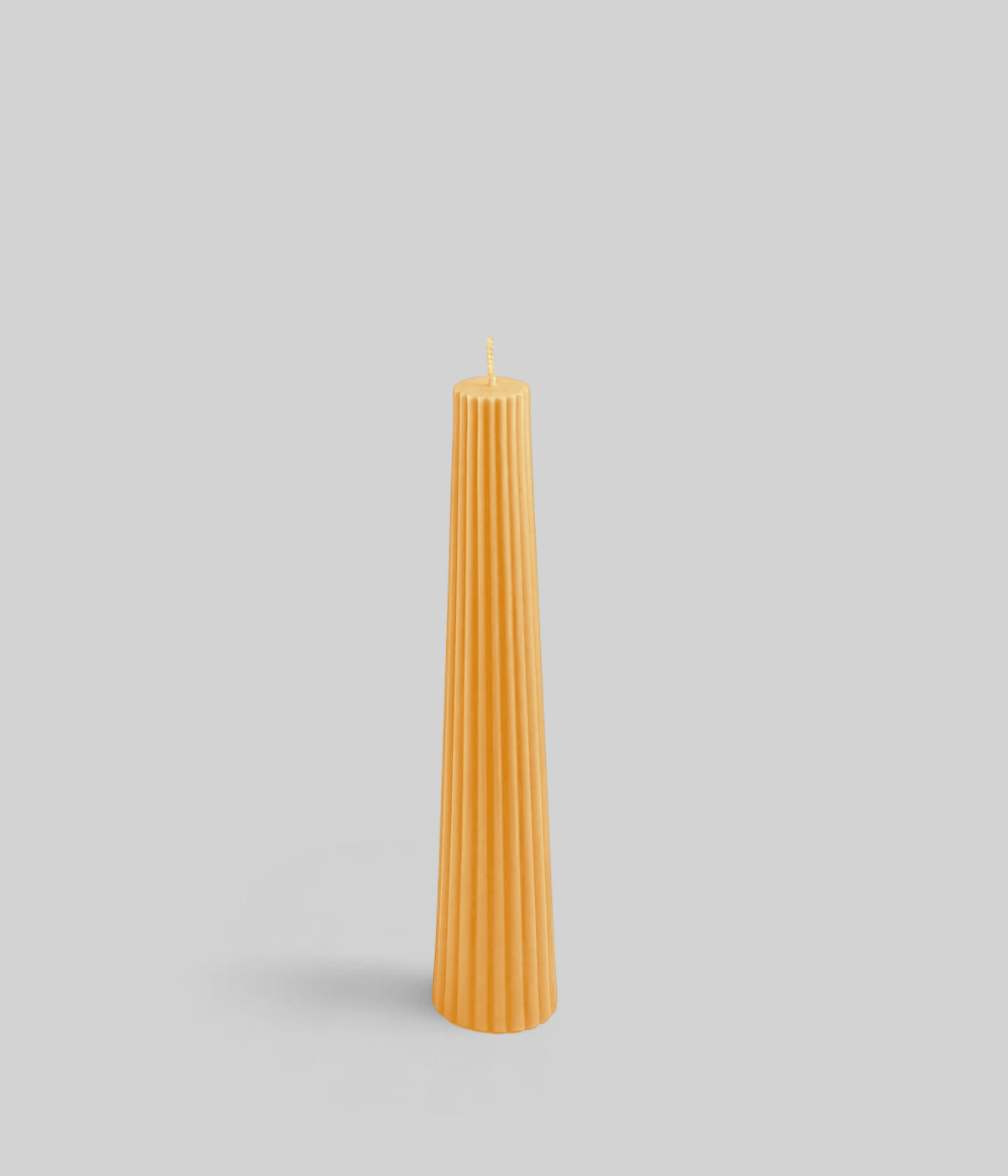 Beeswax wee pine cone candles in natural finish, hand poured in New York