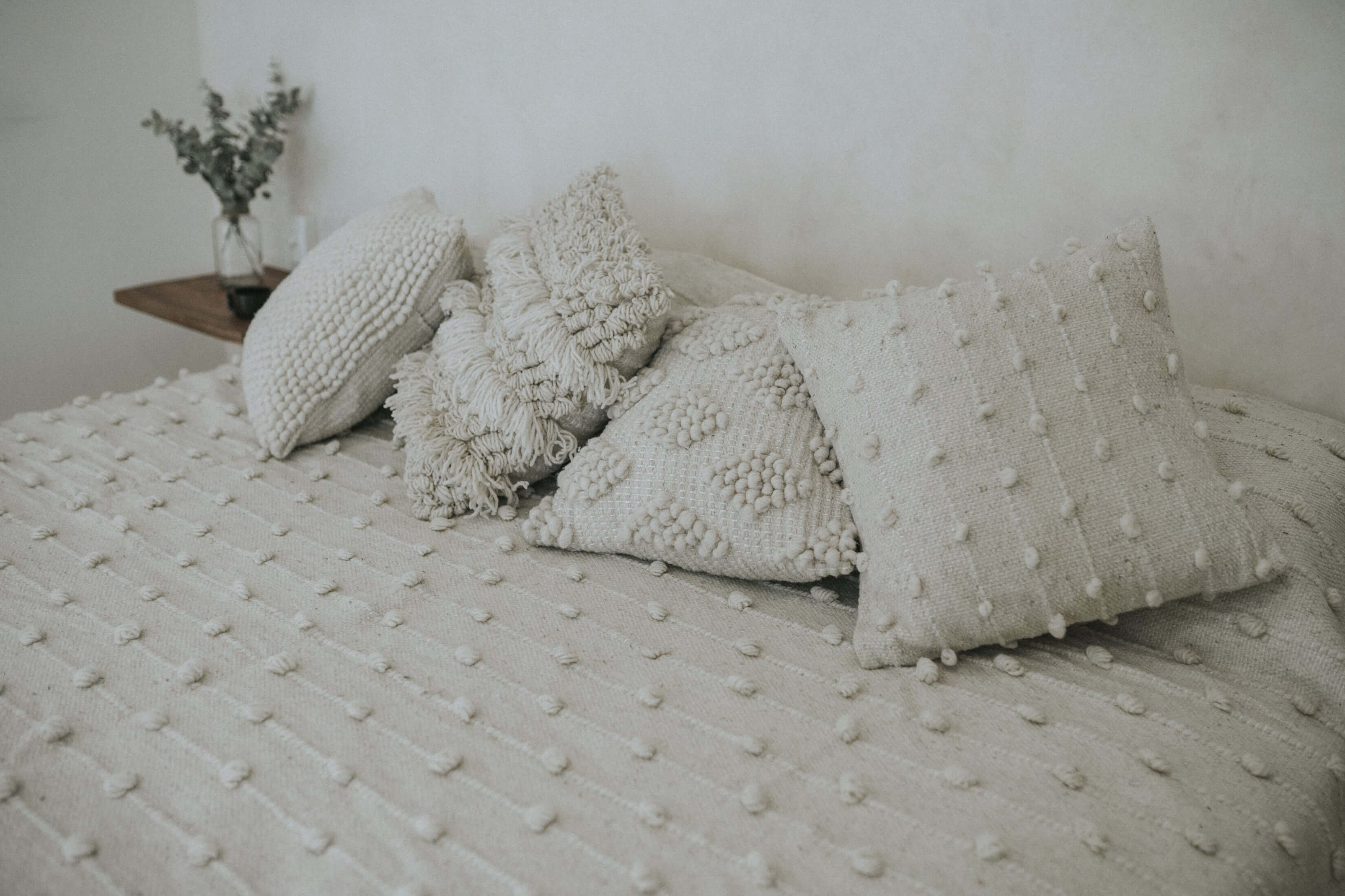 Tweed throw pillows crafted in a small family workshop