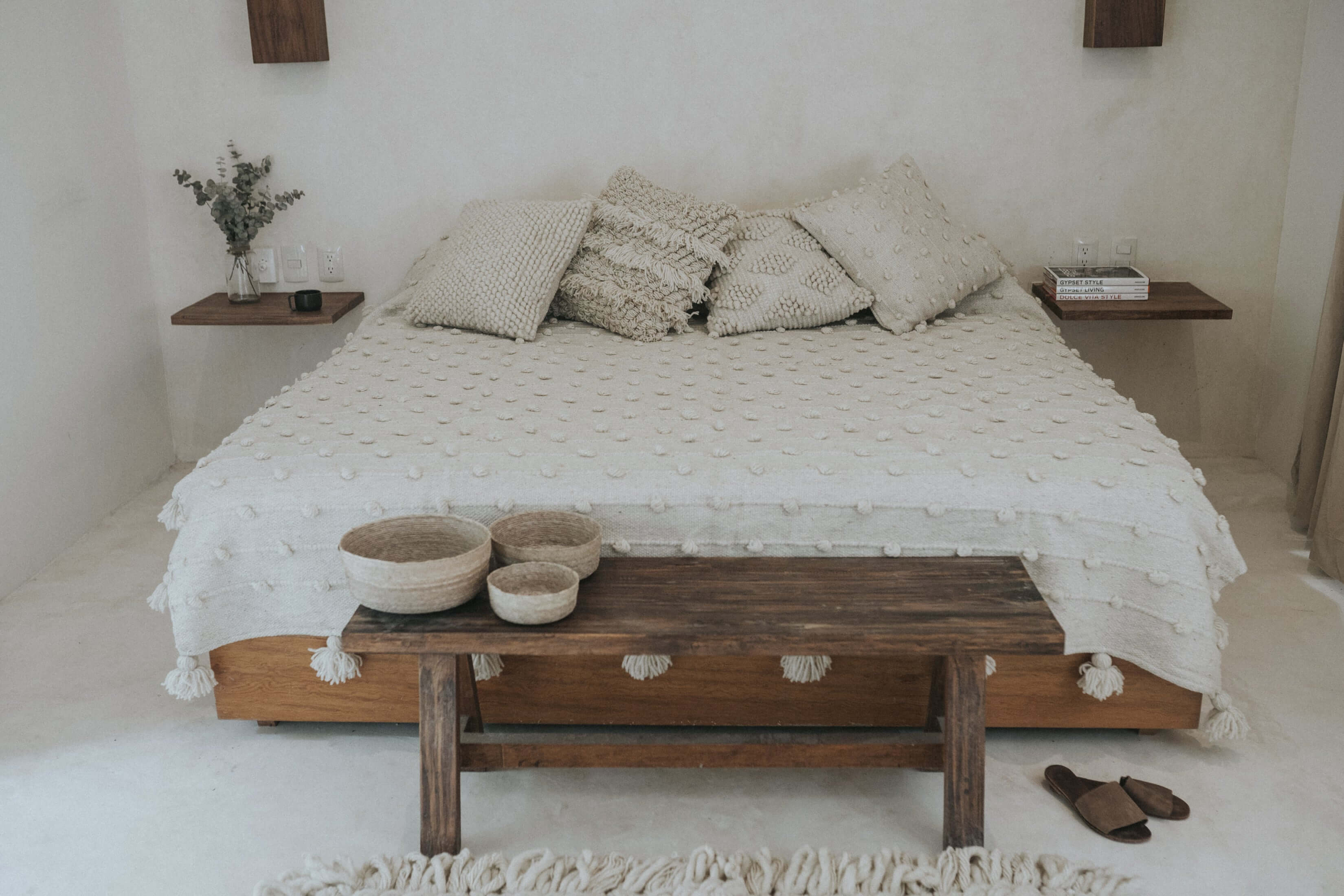 bed with white bedding and 20x20 throw pillows
