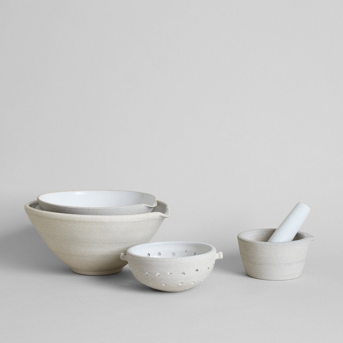 Vermont kitchen ceramic collection with mixing bowl, mortar and pestle, and colander