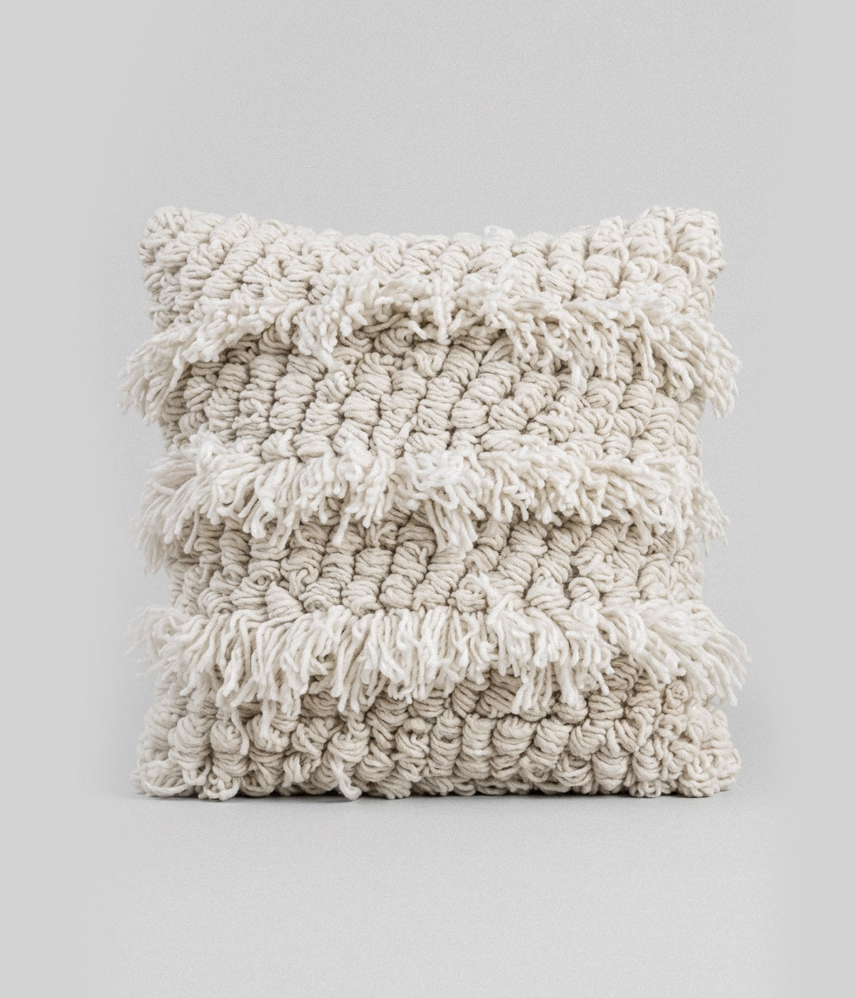 Square wool pillow woven from 100% undyed hand-spun wool