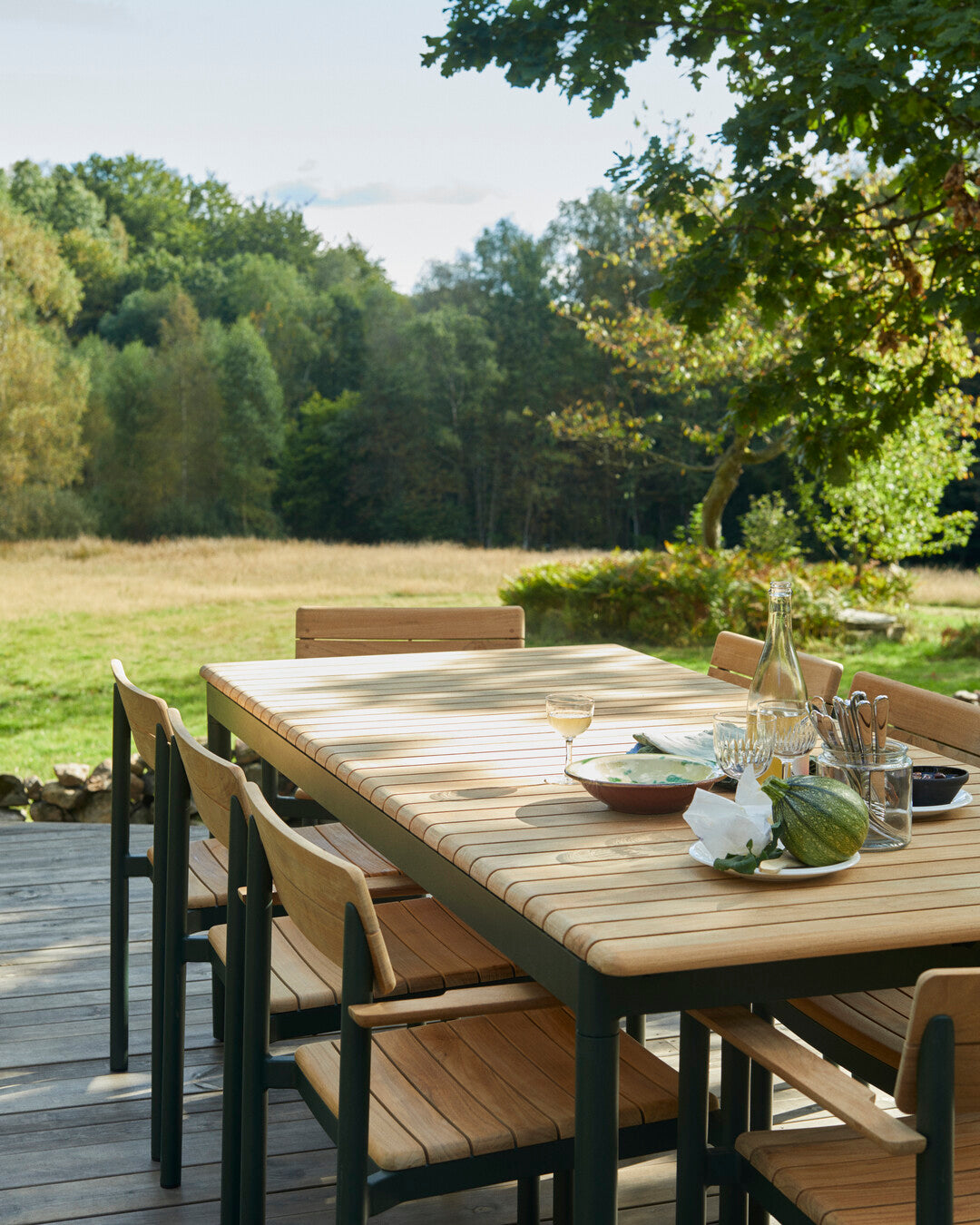 Teak patio dining armchair
