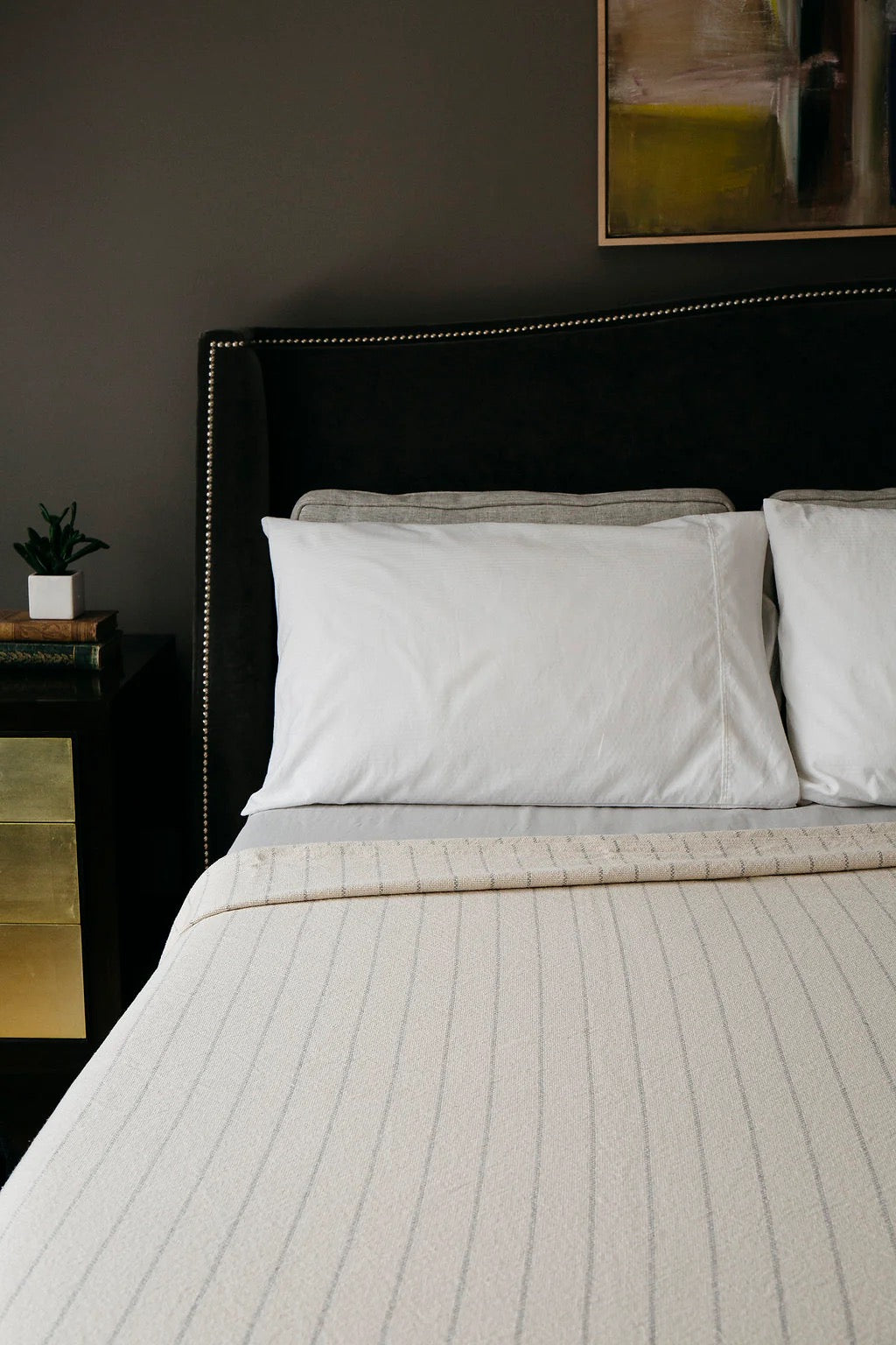Striped blanket in gray pinstripe woven in India available in Queen and King sizes