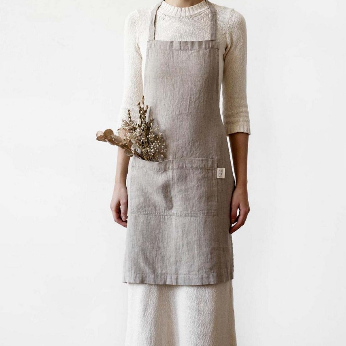 Stonewashed linen apron with front pockets for kitchen or garden tasks