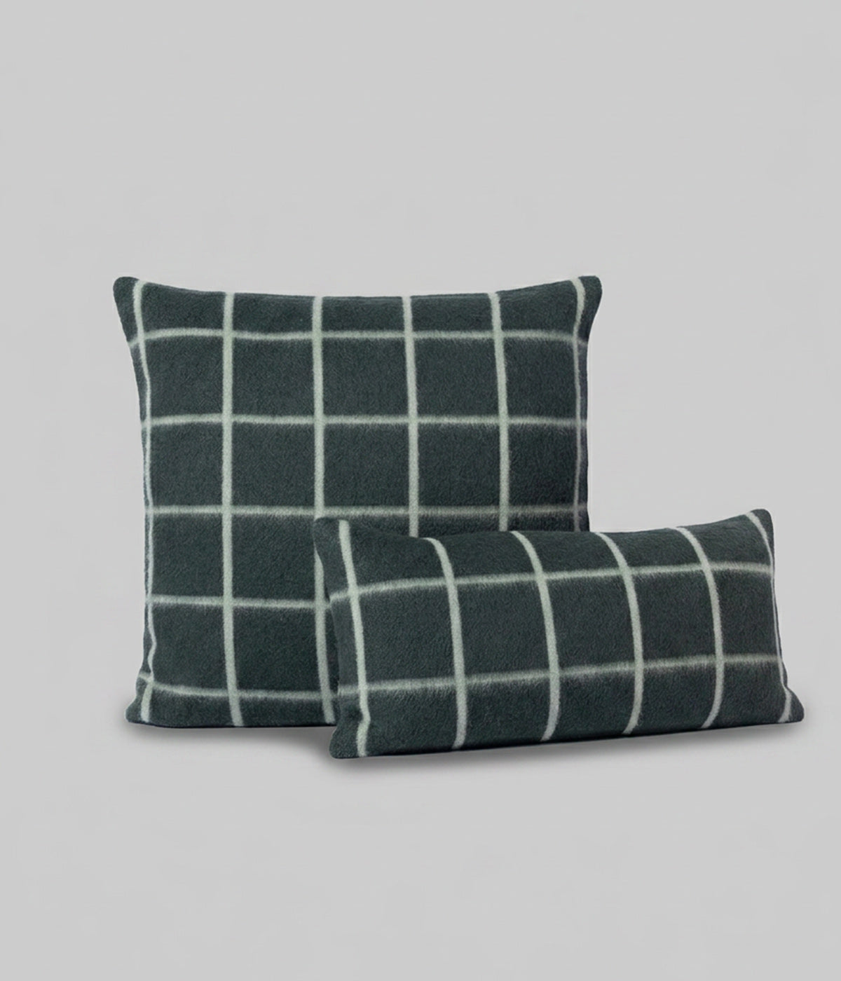 Umi square and lumbar pillows in Darkest Spruce and onsen grid