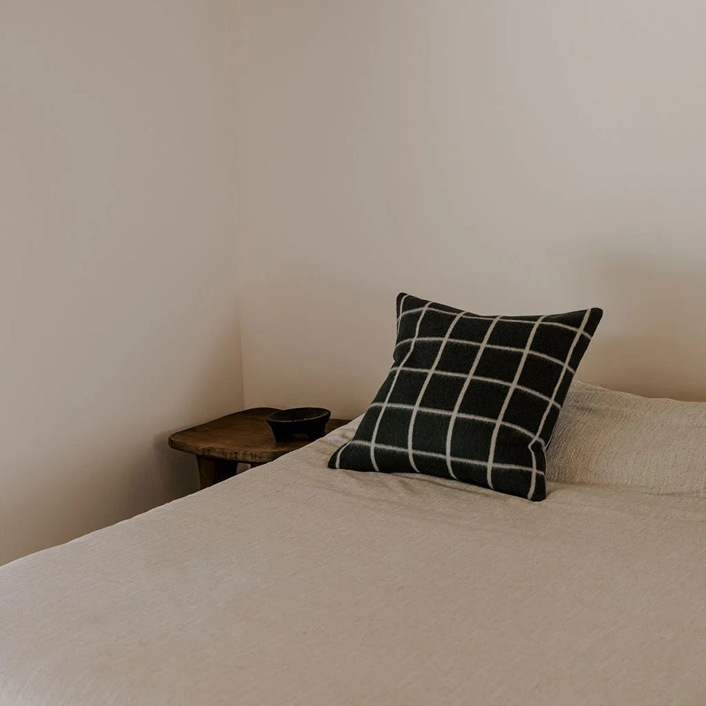 Umi large throw pillow showing full 23x23 format and grid pattern