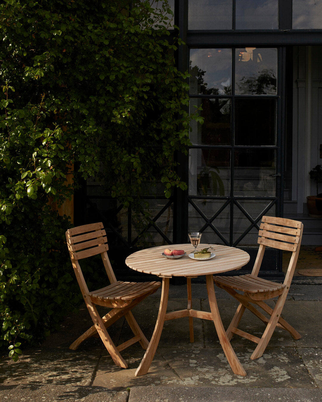 Compact teak patio table
