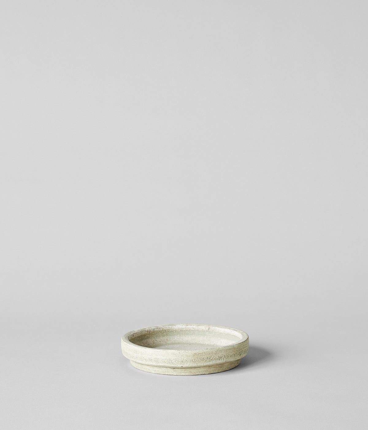 White patina terra cotta planters with trays handmade in Honduras for stylish plant arrangements