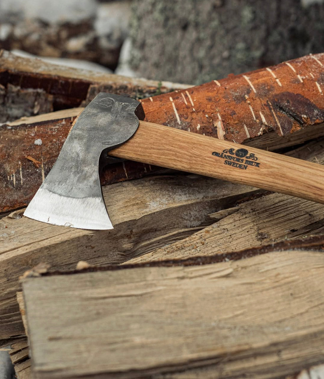 Camping hatchet with sheath and extra reach for small tree felling and limbing