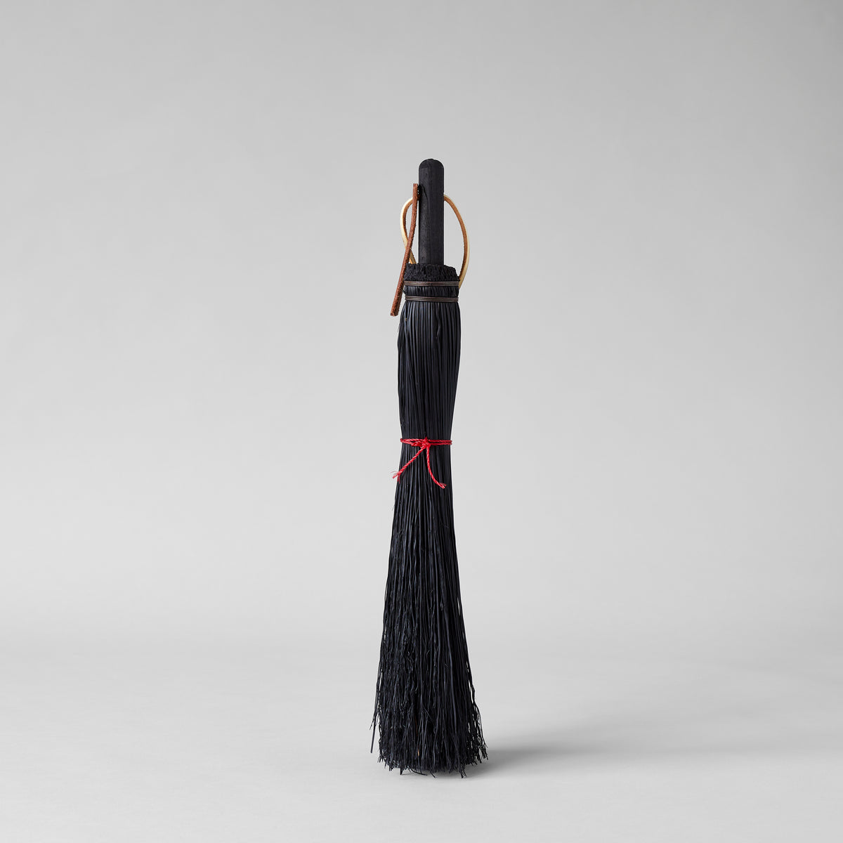 Small broom with wood handle for fireplace and household cleaning