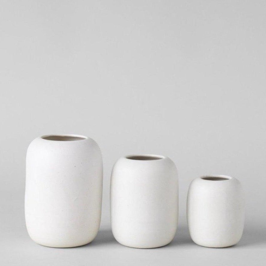 White stoneware vase with soft eggshell glaze and rounded form